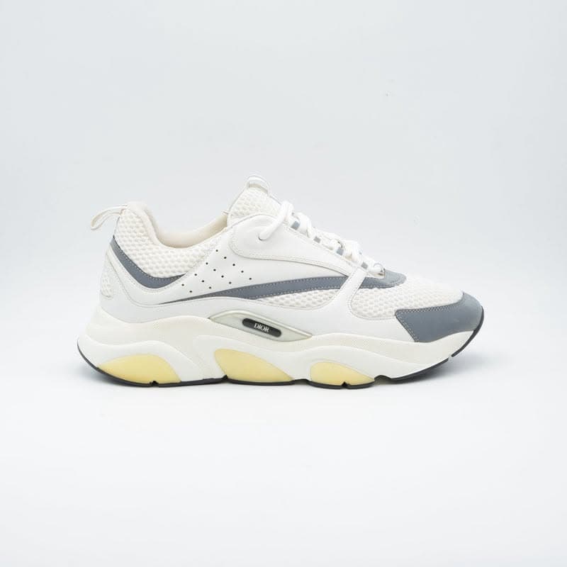 Sneakers blanche avec détails jaunes